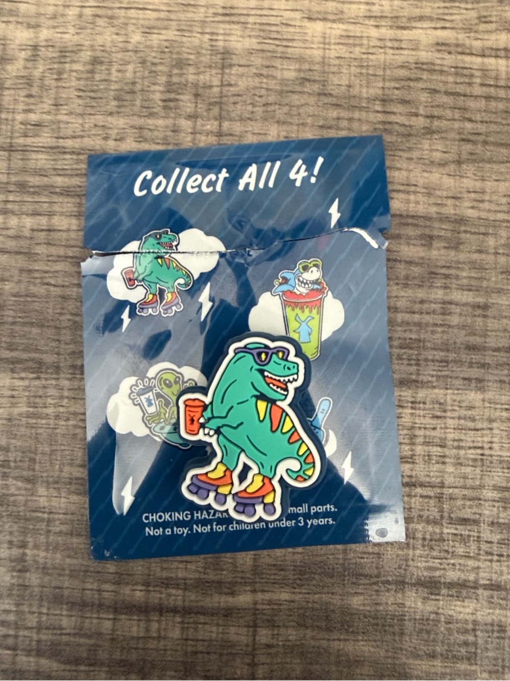 Dutch Bros Green T-Rex Roller Pin with Orange & Purple Accents shoe charm